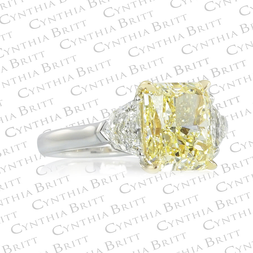 4.12 carat Fancy Yellow Diamond Three Stone Engagement Ring