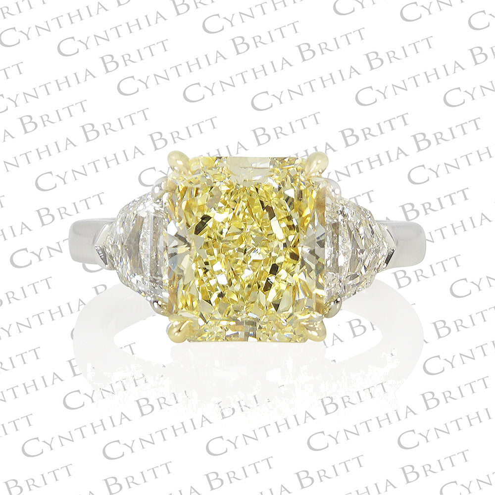 4.12 carat Fancy Yellow Diamond Three Stone Engagement Ring