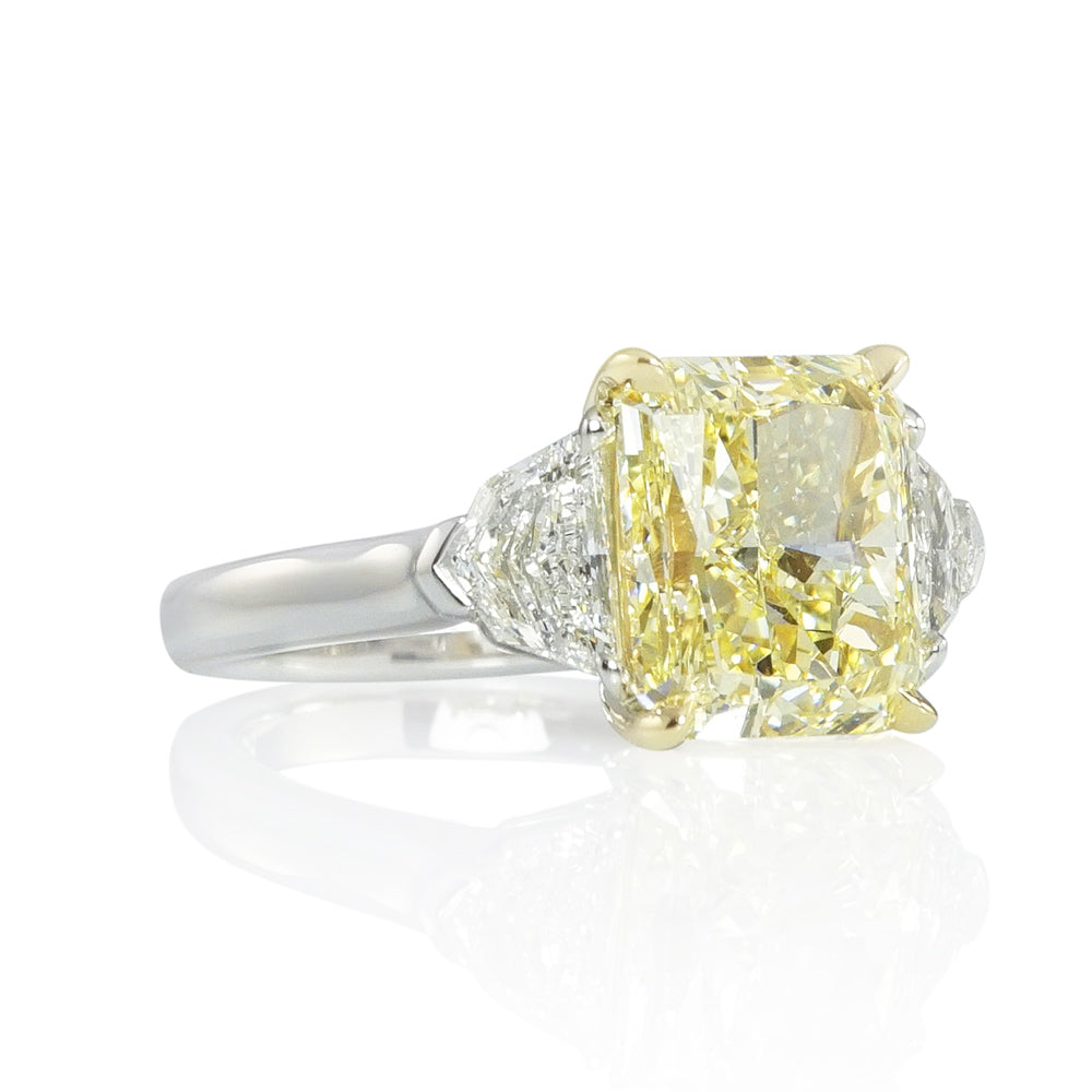 Magnificent Fancy Yellow Diamond Three Stone Engagement Ring