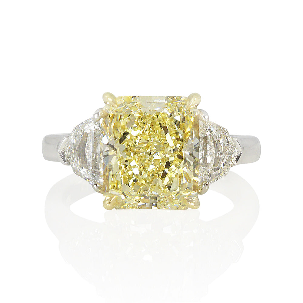 Magnificent Fancy Yellow Diamond Three Stone Engagement Ring