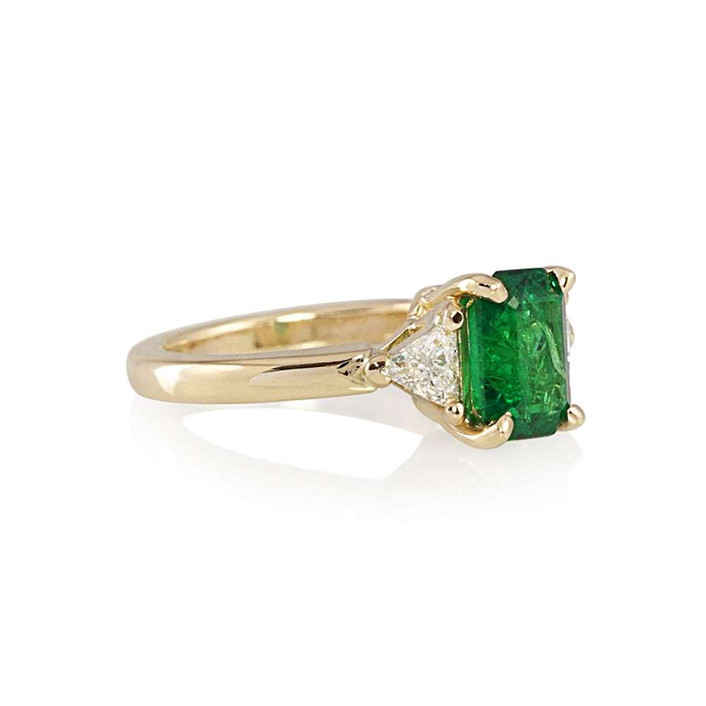 Emerald and Trillion Diamond Three Stone Engagement Ring