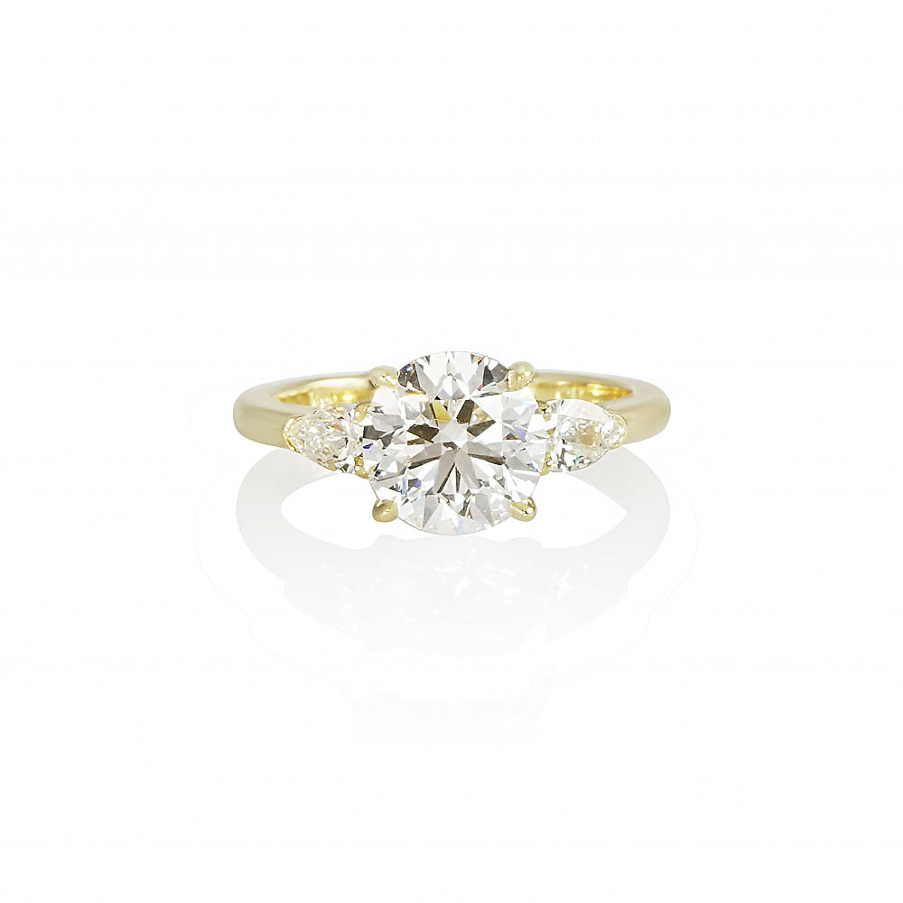 Round and Pear Three Stone Engagement Ring for Emma