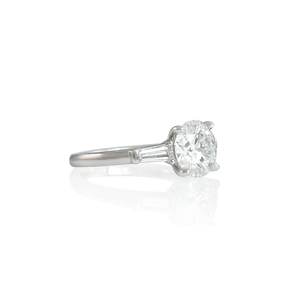 Round and Tapered Baguette Classic Engagement Ring for Eve