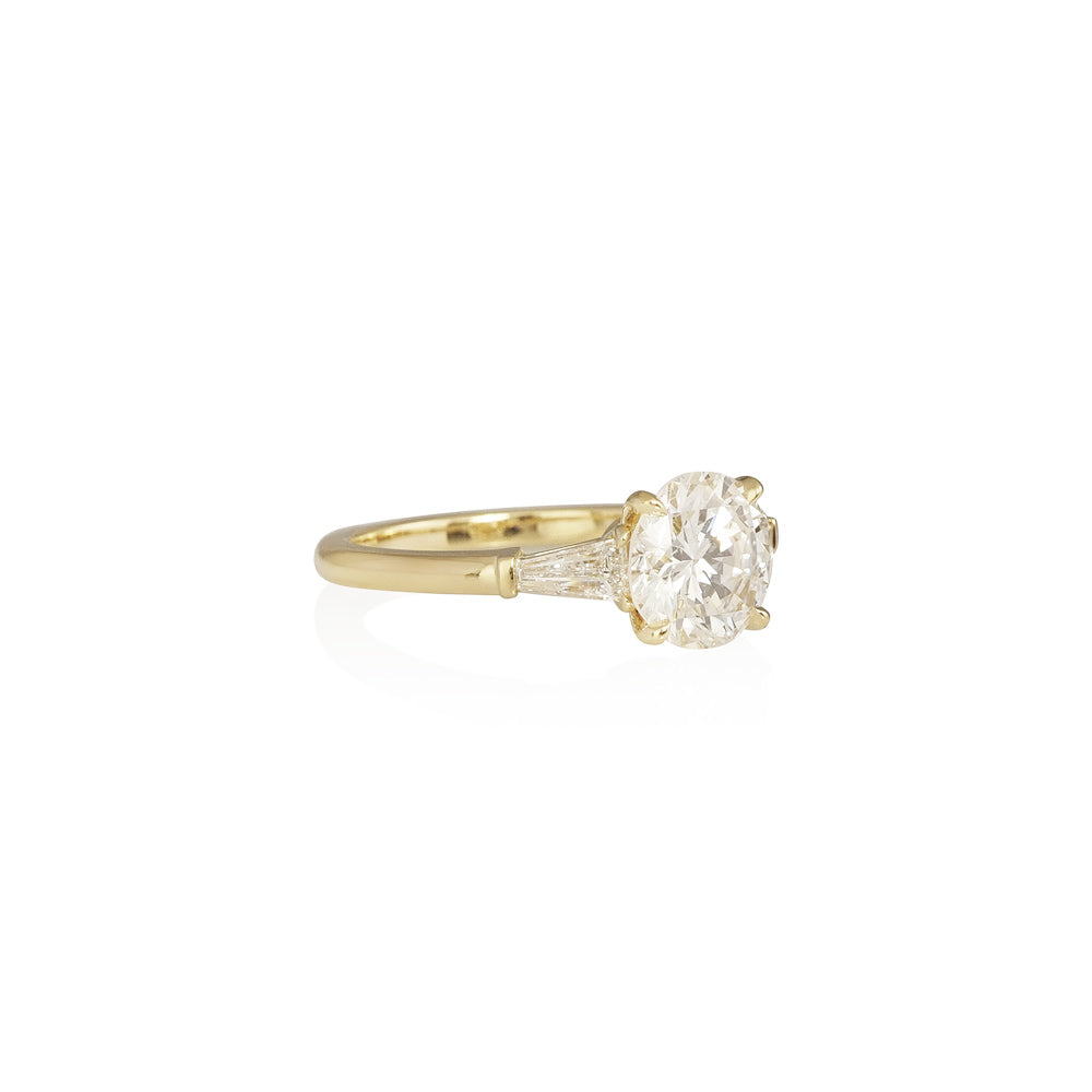 Round and Tapered Baguettes Engagement Ring for Anusha